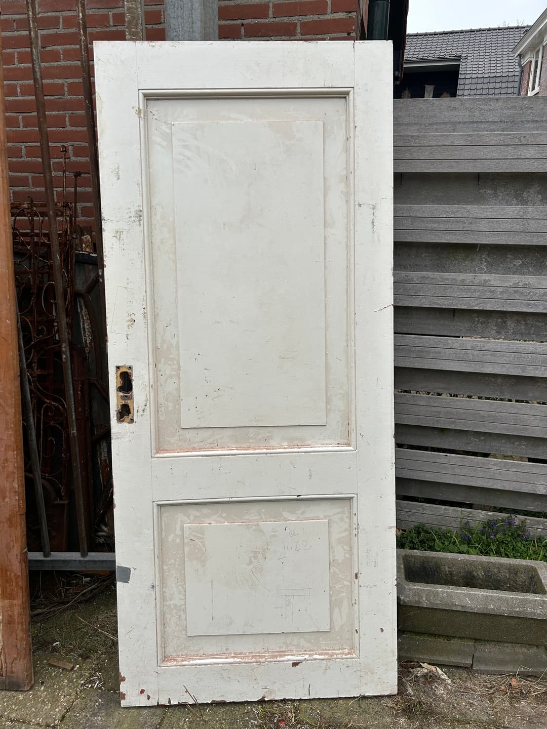 Oude paneeldeur afkomstig uit Amsterdam