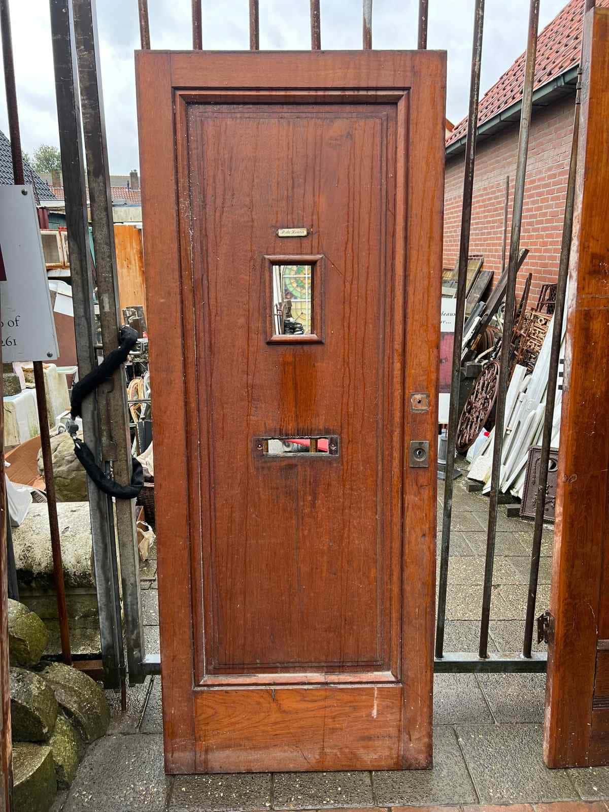 Hardhouten voordeur met ruitje
