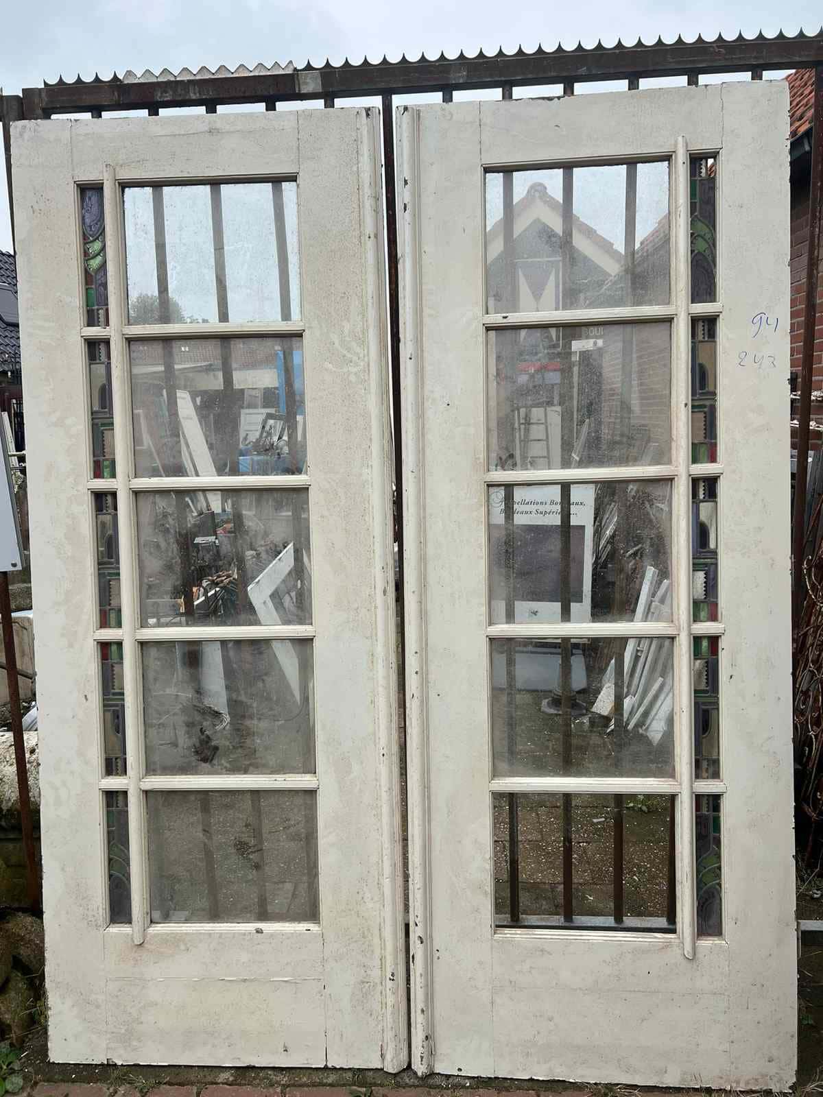Oude kamer en suite deuren met glas