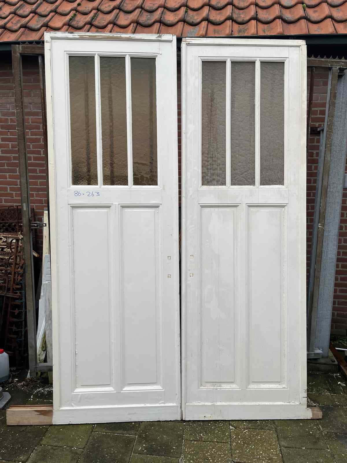 Set hoge kamer en suite schuifdeuren