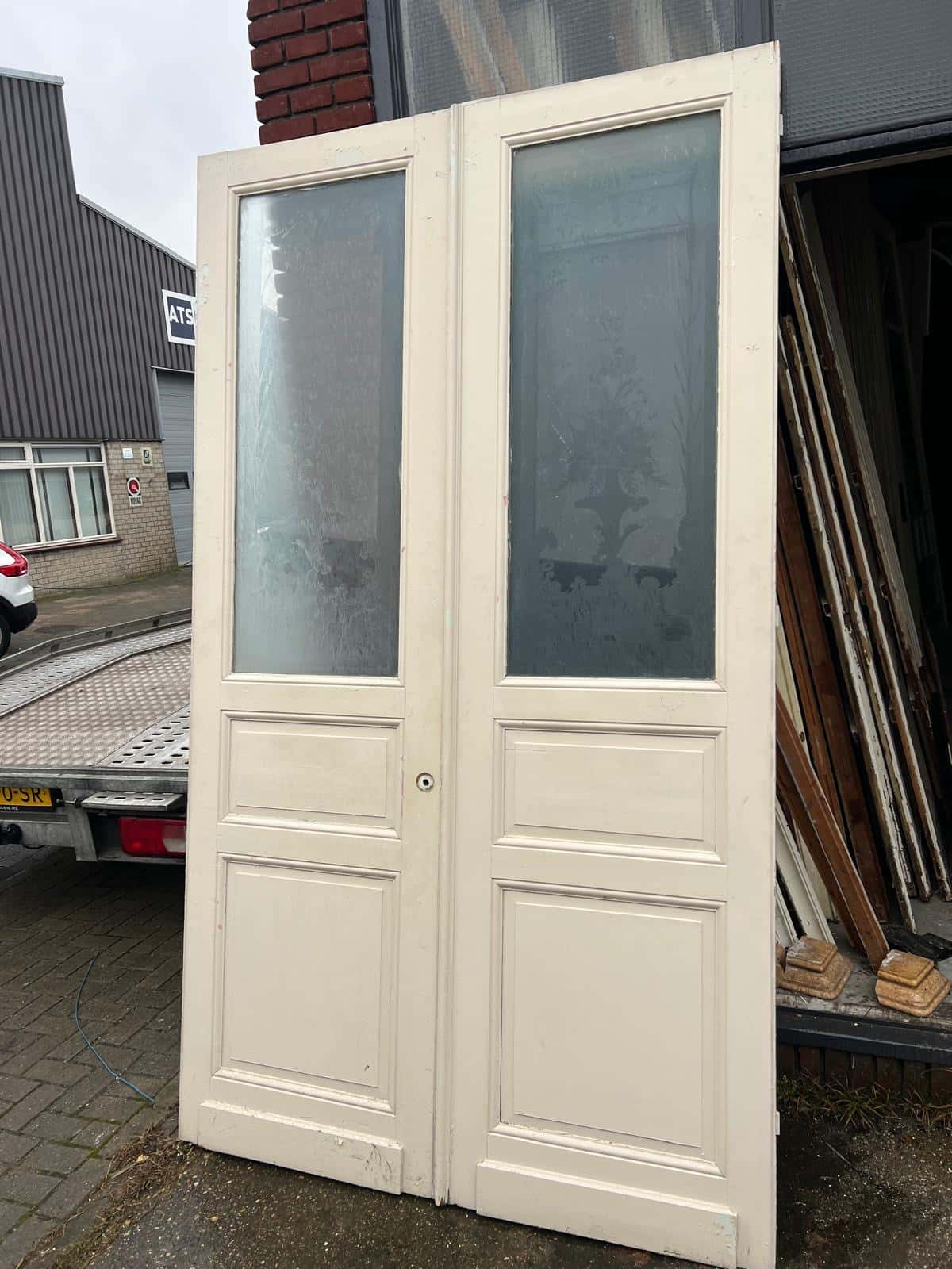 Set portaaldeuren met glas